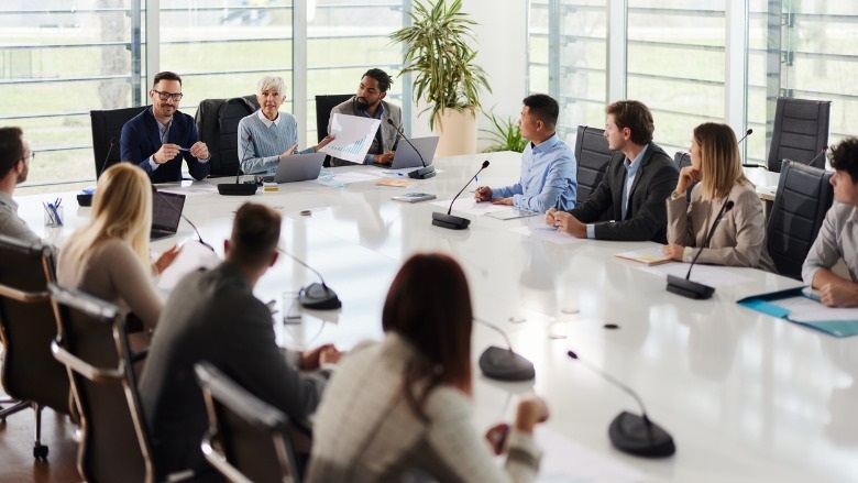 Blurry image of a board meeting