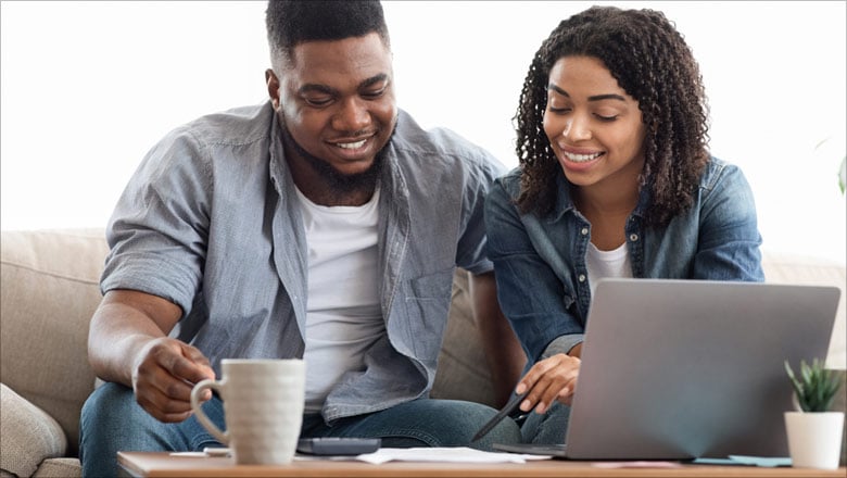 couple looking at a laptop
