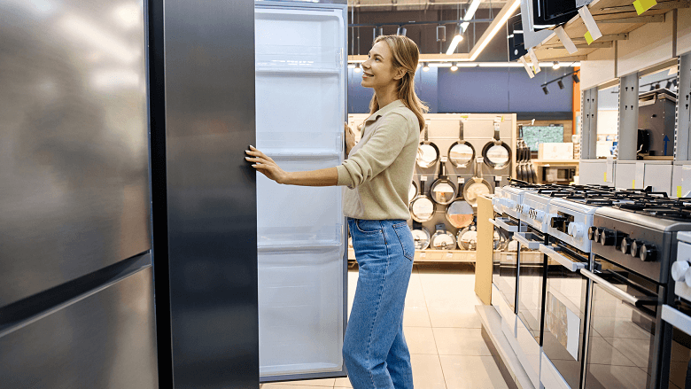 woman shopping for new refrigerator