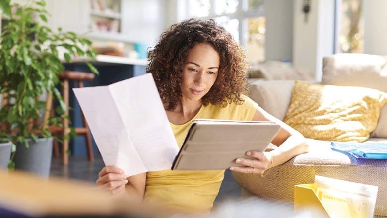 Woman with paperwork