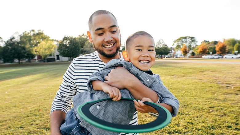 Father and son playing