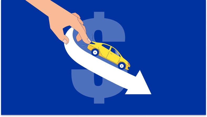 image of finger pushing car down an arrow