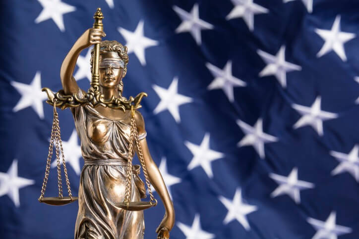 lady of justice with American flag