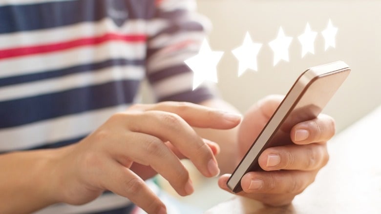 mans hands with a cell phone