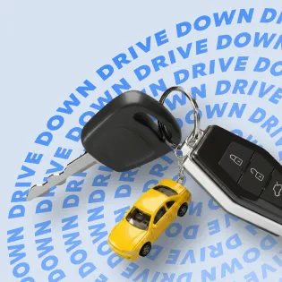 key chain with a tiny car attached