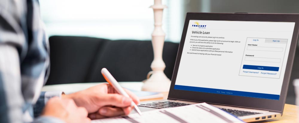 vehicle loan application on a laptop