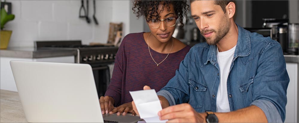 couple looking at a laptop