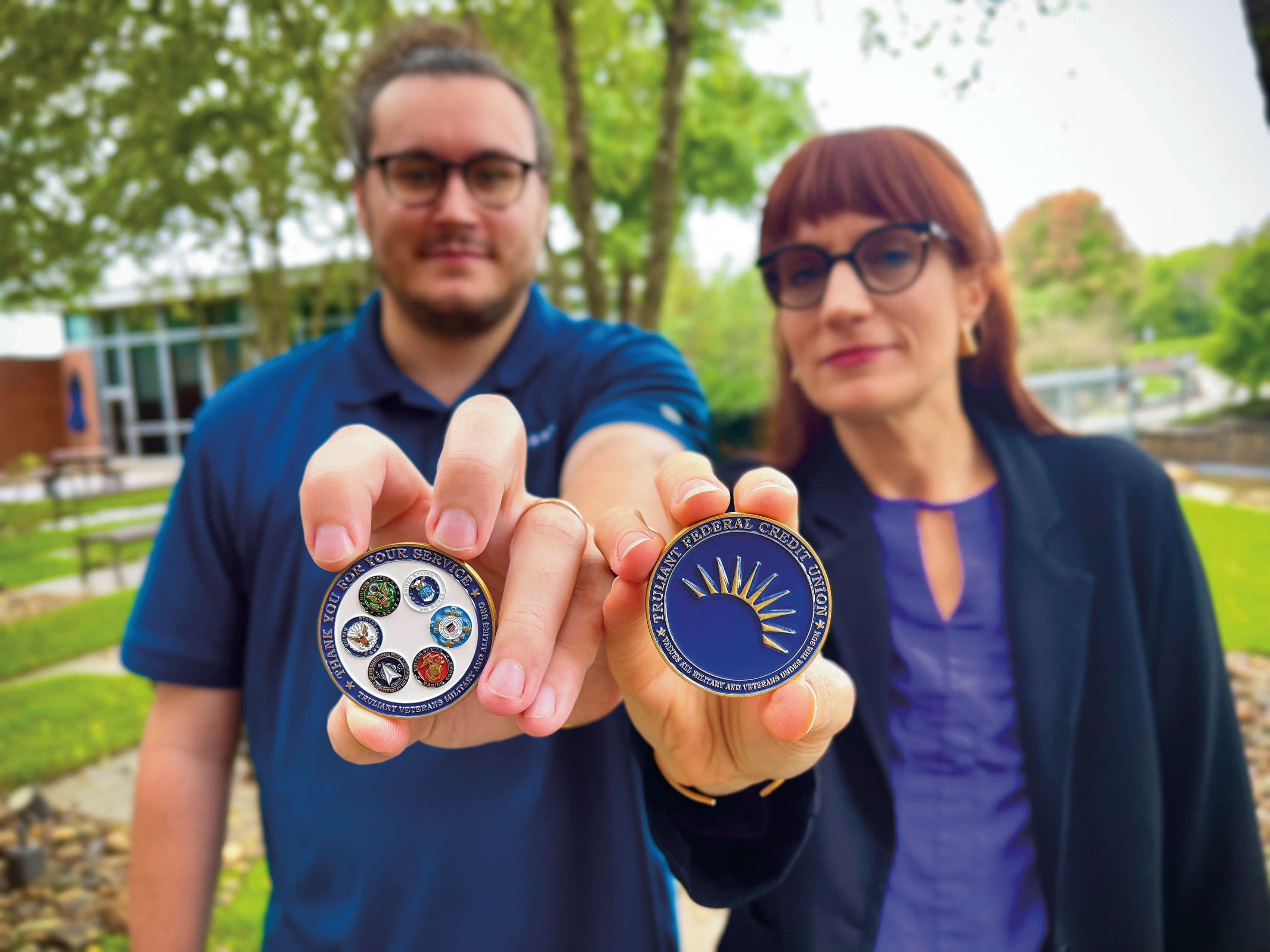 zoom in on two verteran brg coins