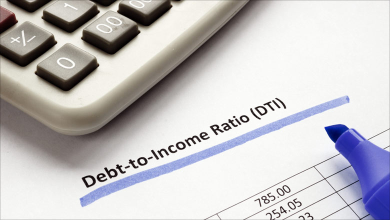 Debt to Income Ratio paper with a calculator