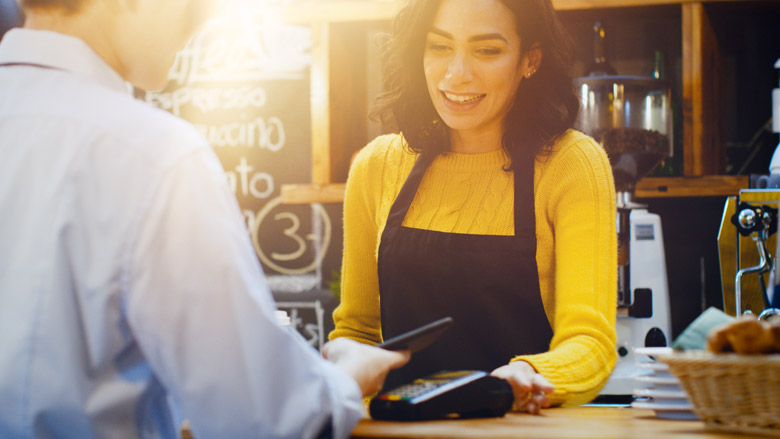 merchant helping a customer