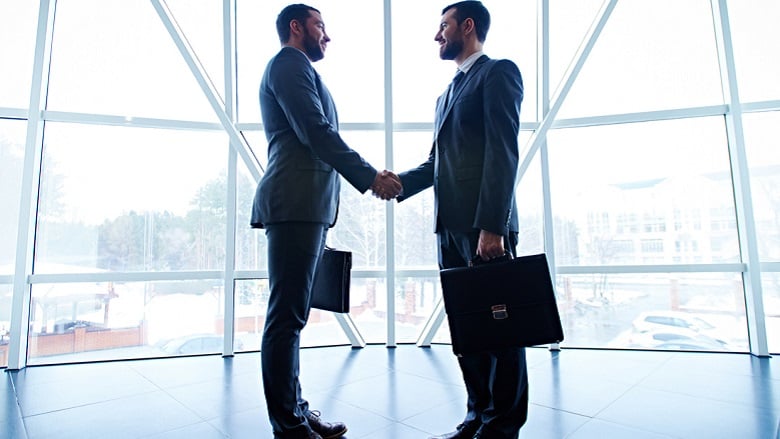 Two businessmen shaking hands