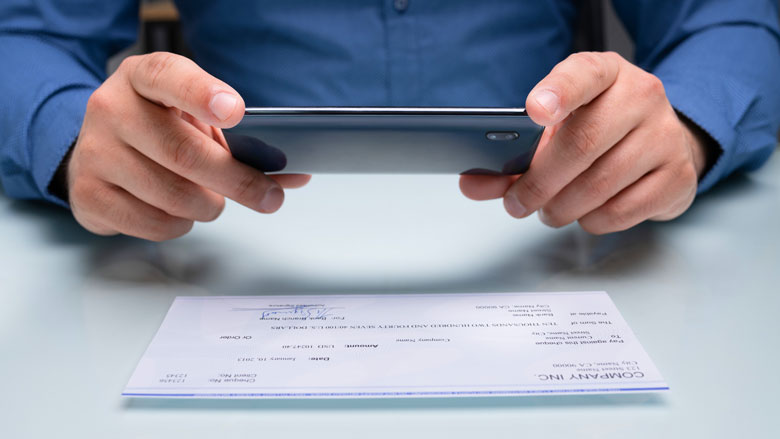 Mobile depositing a business check