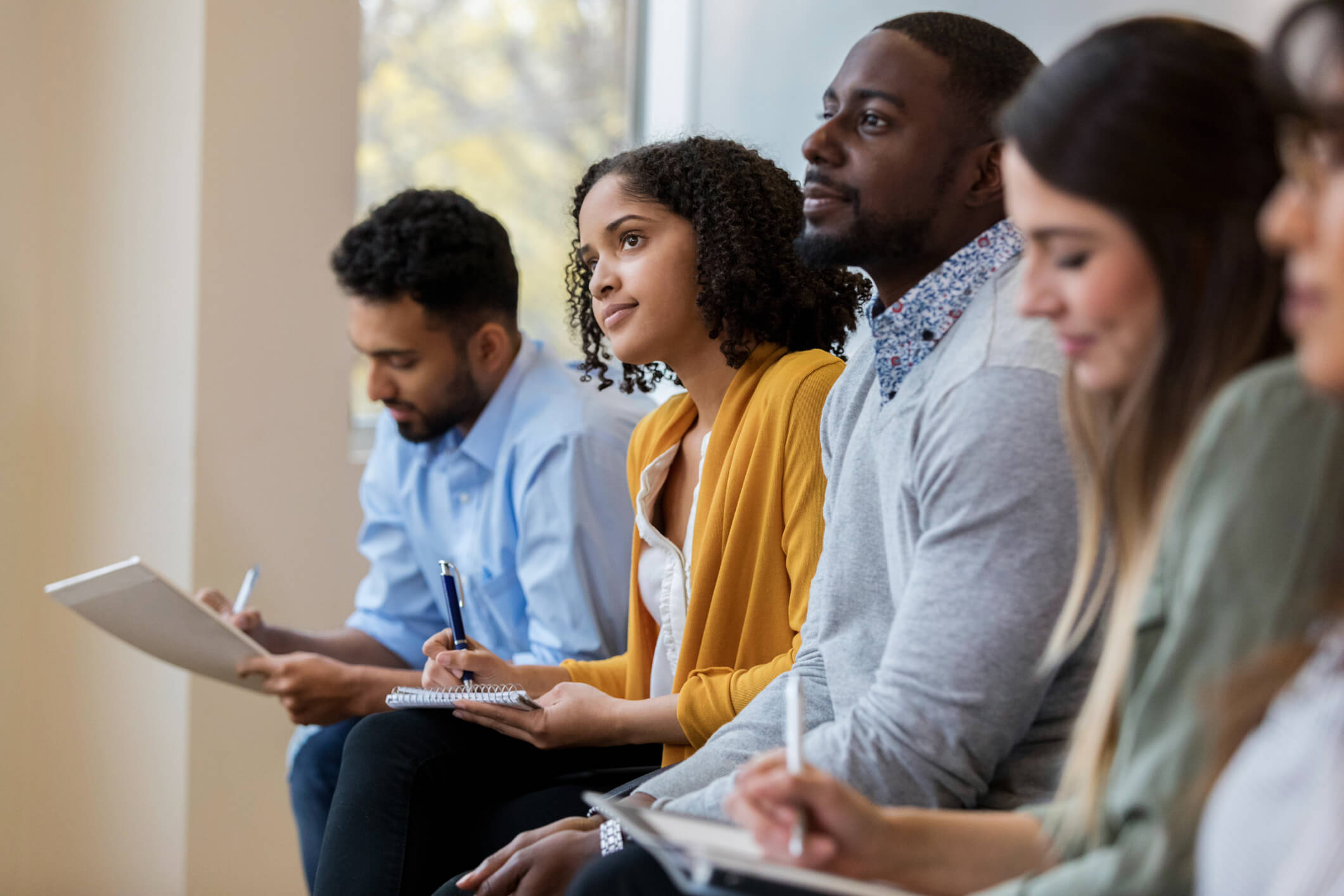 diverse team in training classroom