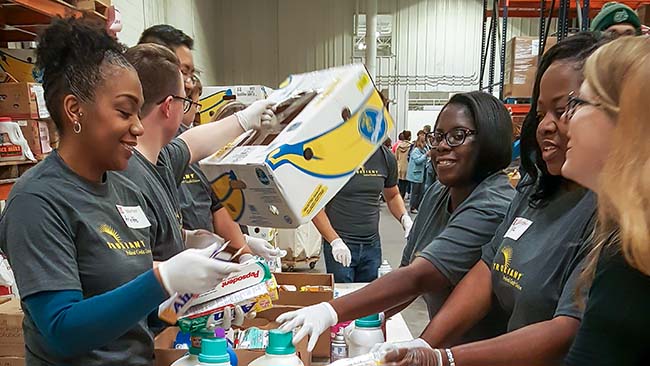 Truliant employees volunteering at food bank