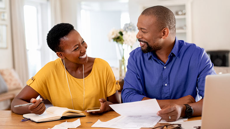 Couple managing their Truliant checking account