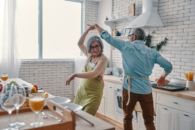 A couple dancing in the kitchen