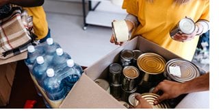 People making food donation box