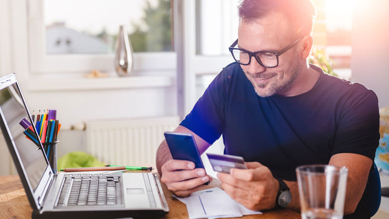 man checking his truliant mobile app on his phone