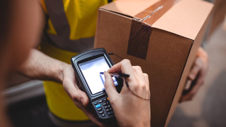 Woman receiving packages at a business