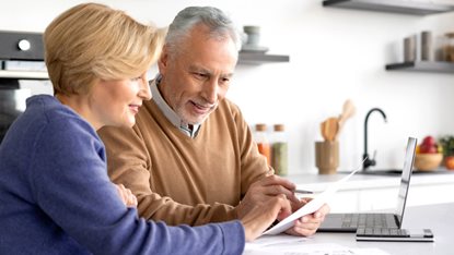 mature couple looking at finances