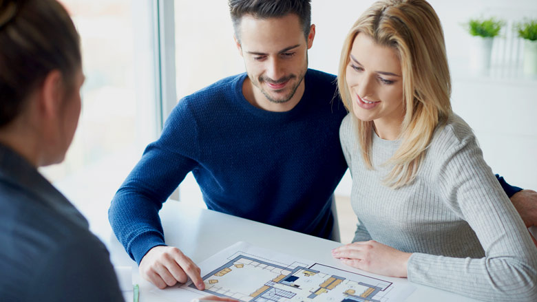 Young couple planning their new home