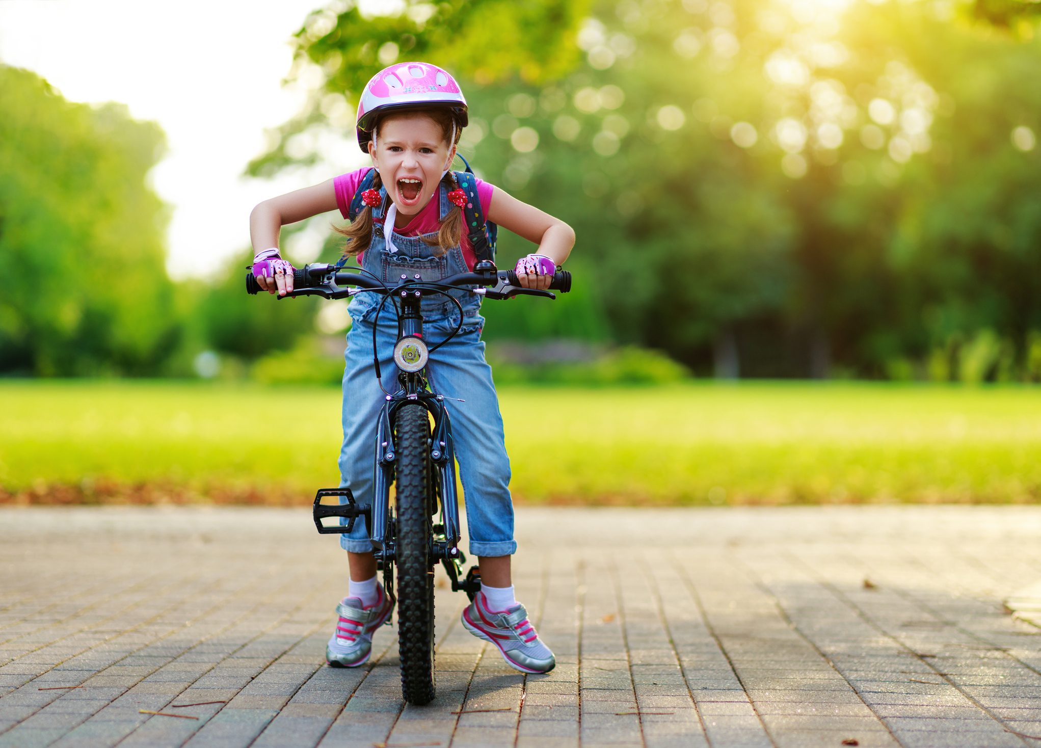young girl on bike