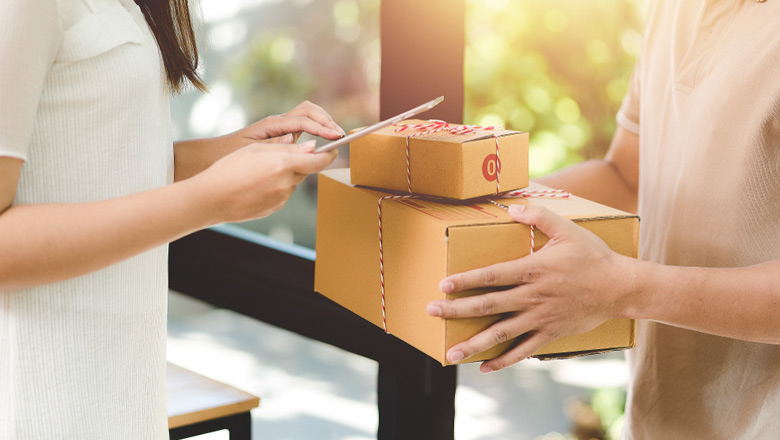 Woman receiving packages at a business